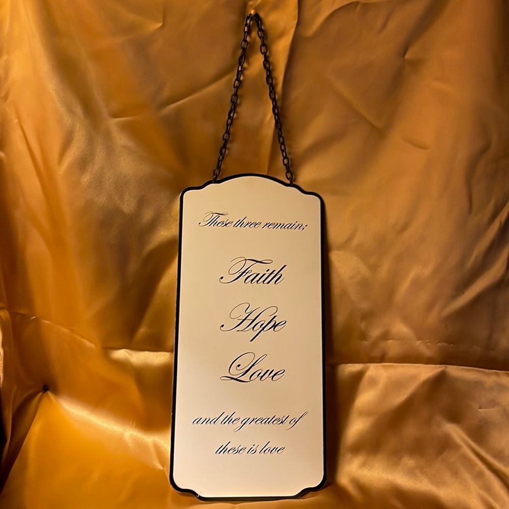 Porcelain hanging sign with saying “These three remain: Faith, hope, love